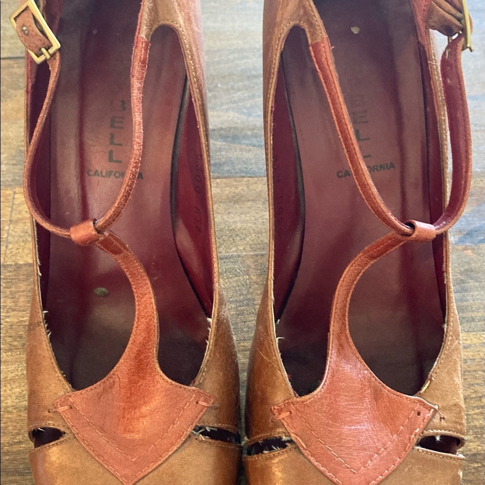 Well loved Jeffrey Campbell ankle strap comfy heels.